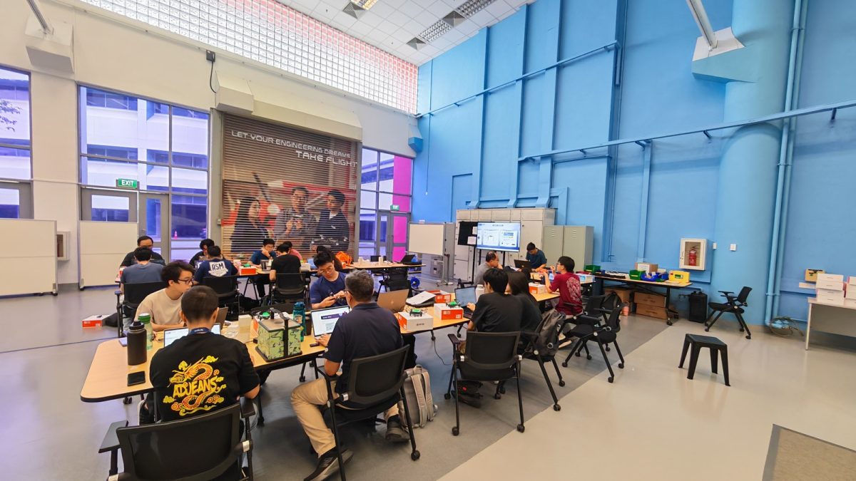 Students and educators participating in an AERISE multi-drone workshop at Nanyang Polytechnic